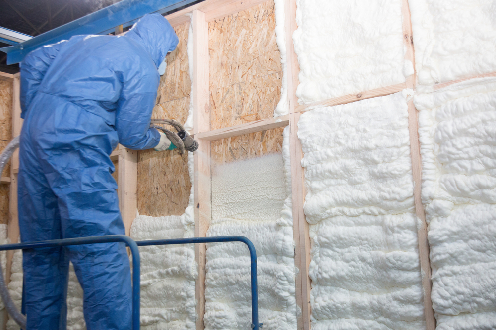 Applying spray foam insulation correctly.