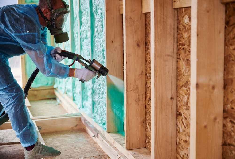 Learning about spray foam insulation installation process.